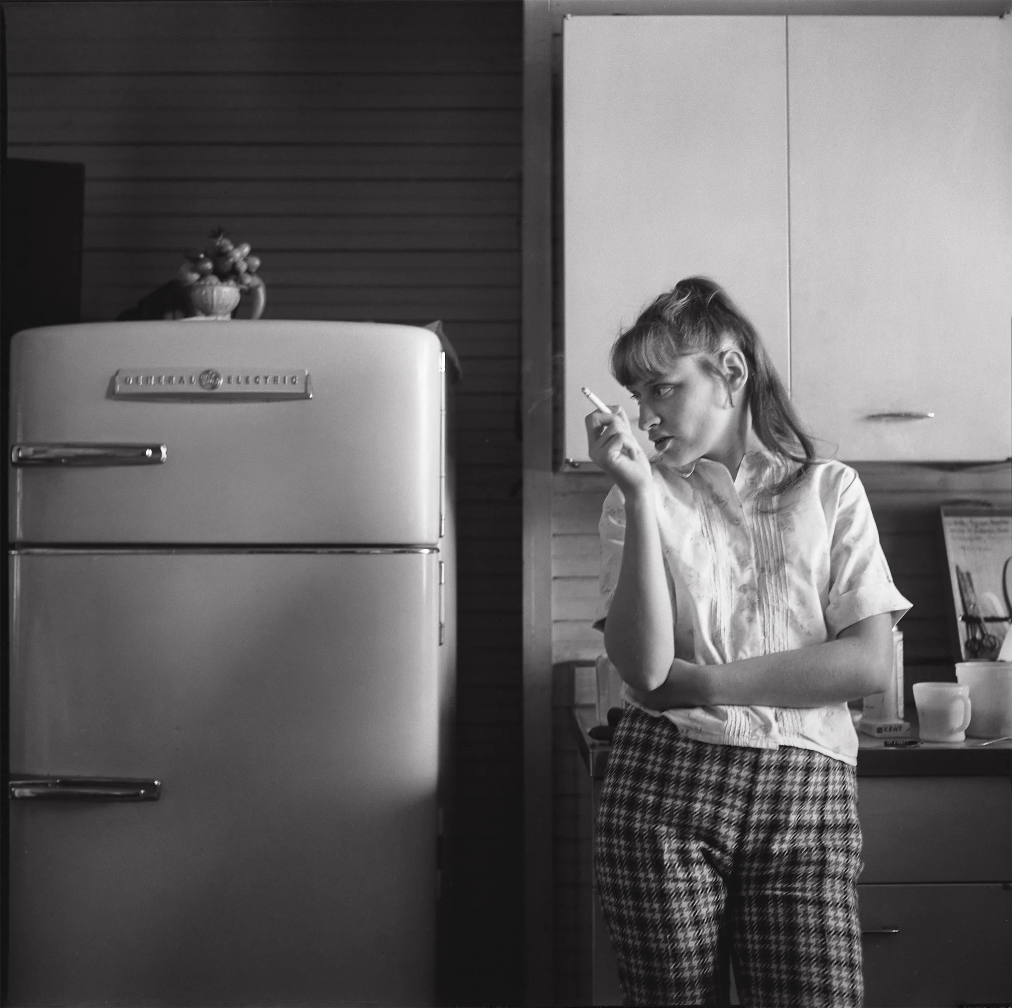 Ruth in Her Mother’s Kitchen, Danville, Virginia by Emmet Gowin