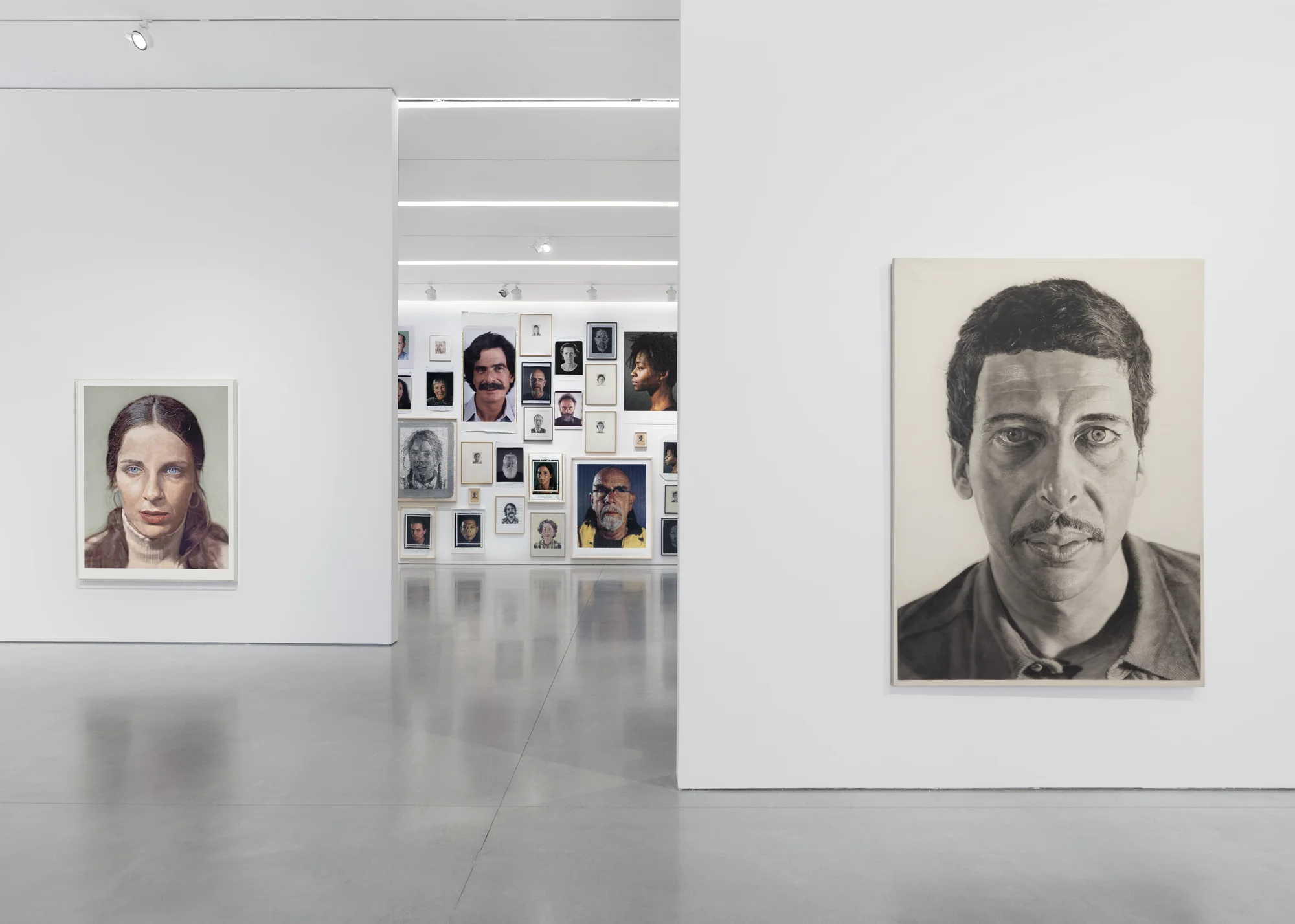Installation view of On Paper by Chuck Close