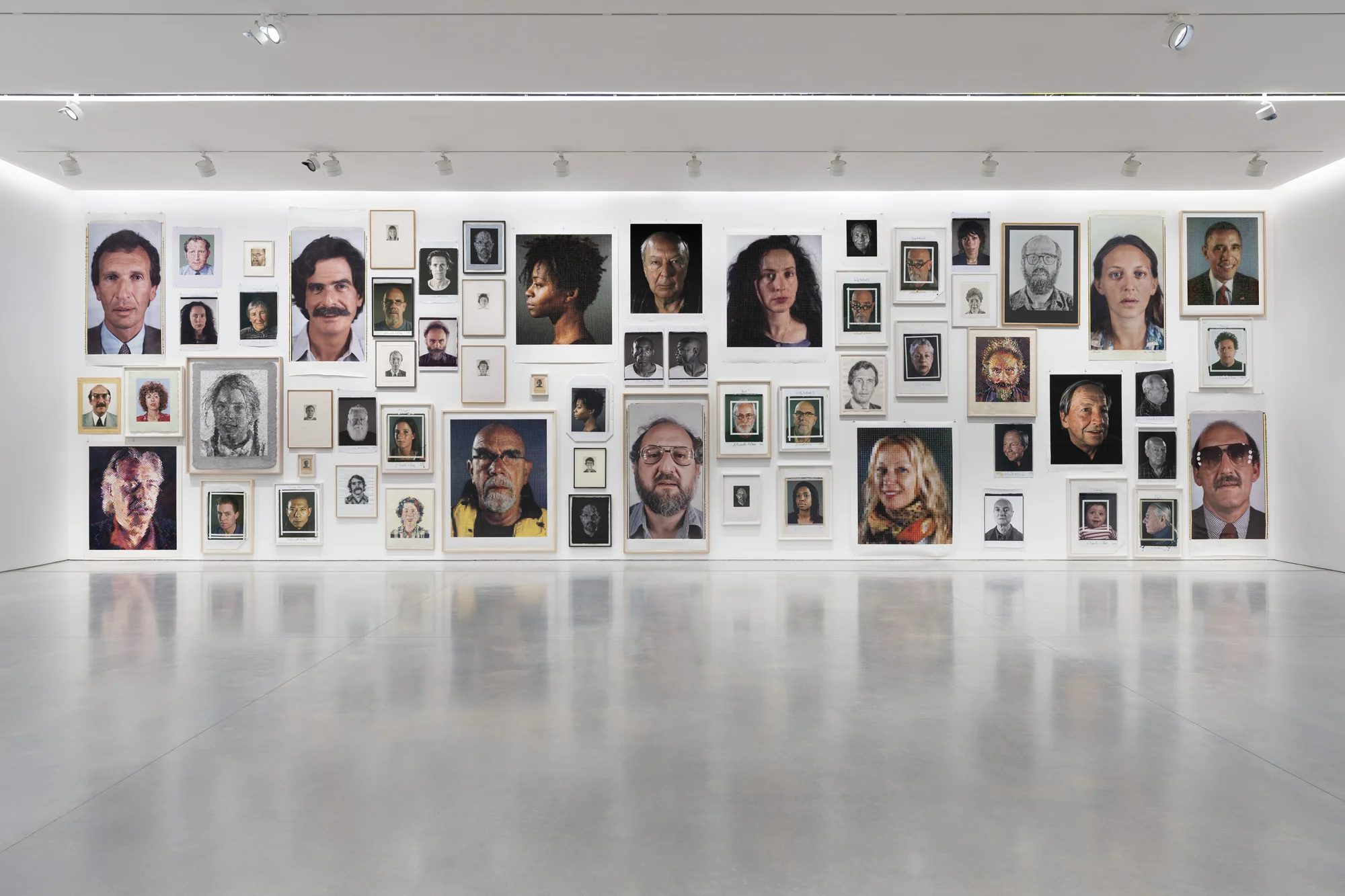 Installation view of On Paper by Chuck Close