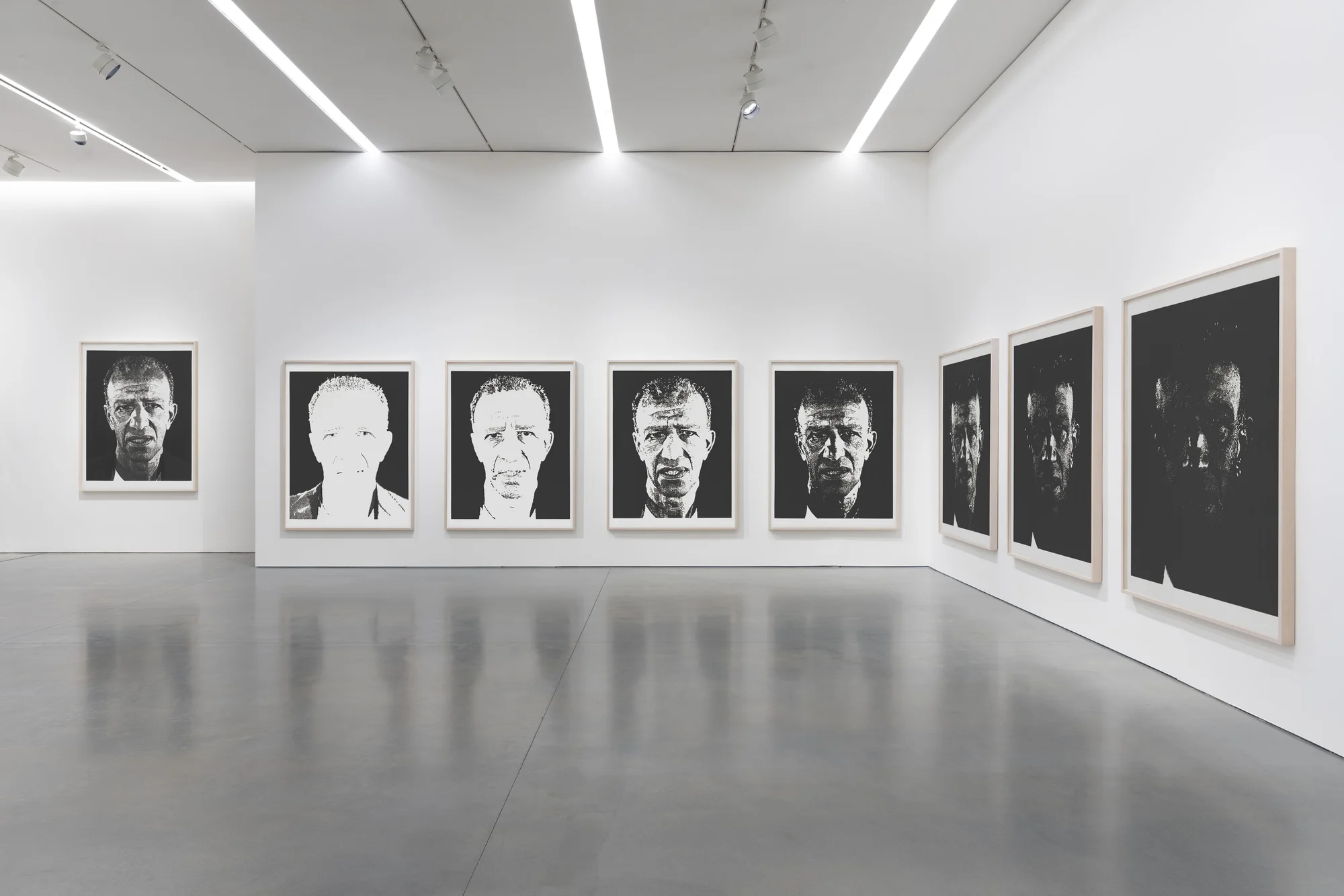 Installation view of On Paper by Chuck Close