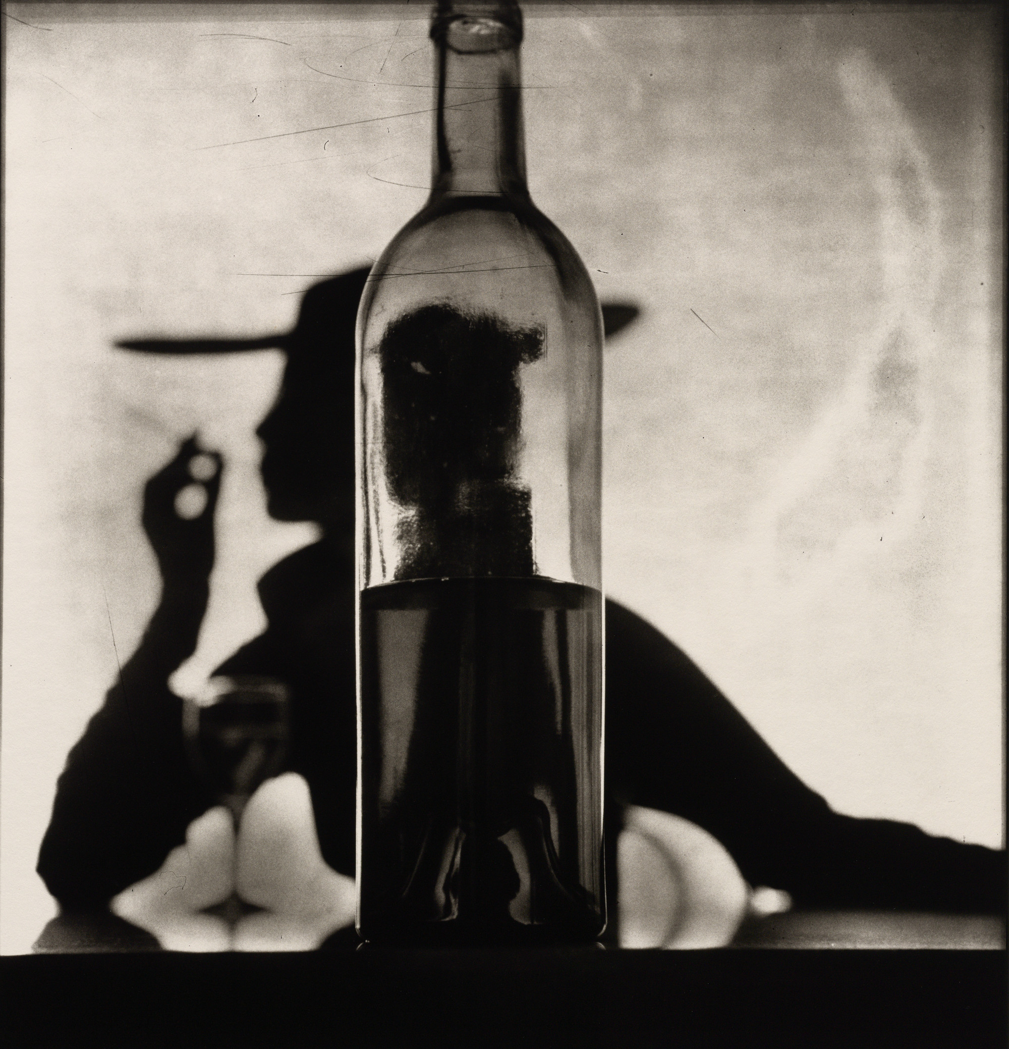 Girl Behind Bottle by Irving Penn