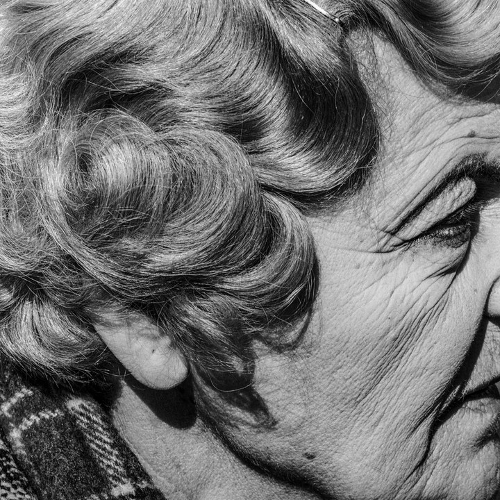 David Goldblatt — Woman with pierced ear. Joubert Park, Johannesburg.