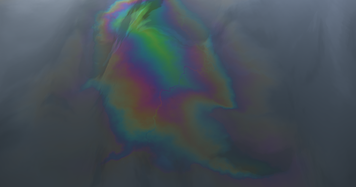 An iridescent rainbow slick in the shape of a country floating on dark grey water